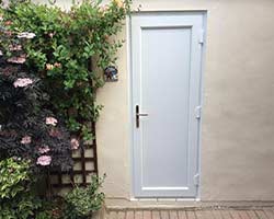 solid white upvc back door