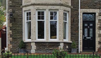 sash bay windows with Georgian bars in the top