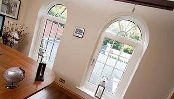 white georgian style tilt and turn inwards opening windows